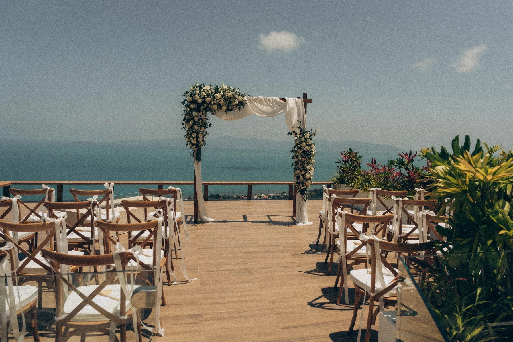 Beach wedding ceremony set beside the sea in Koh Samui
