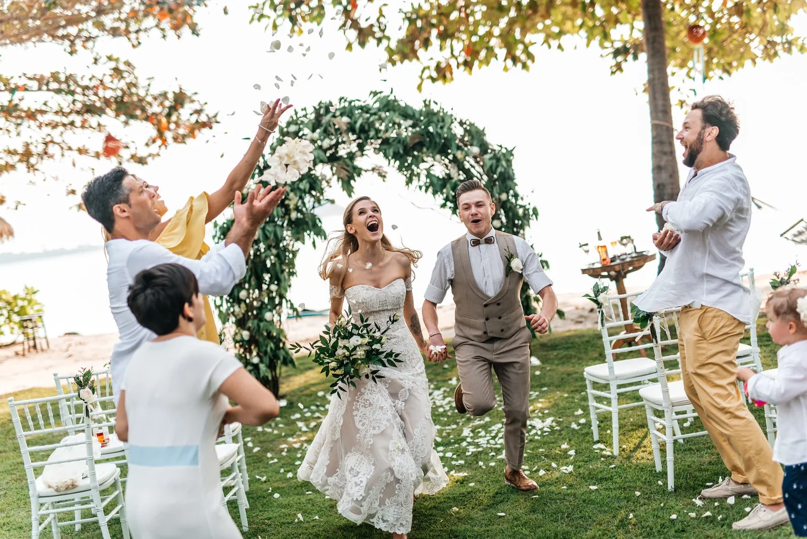 Destination wedding couple celebrating with guests in Koh Samui